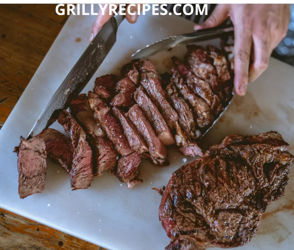 Juicy grilled beef short ribs with a smoky, charred exterior.

